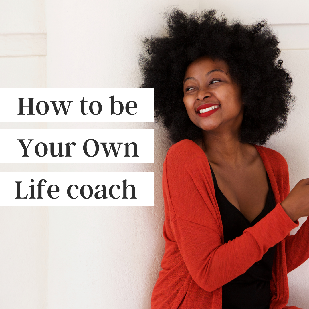 How to be your own life coach written over an image of a smiling black woman wearing a red cardigan
