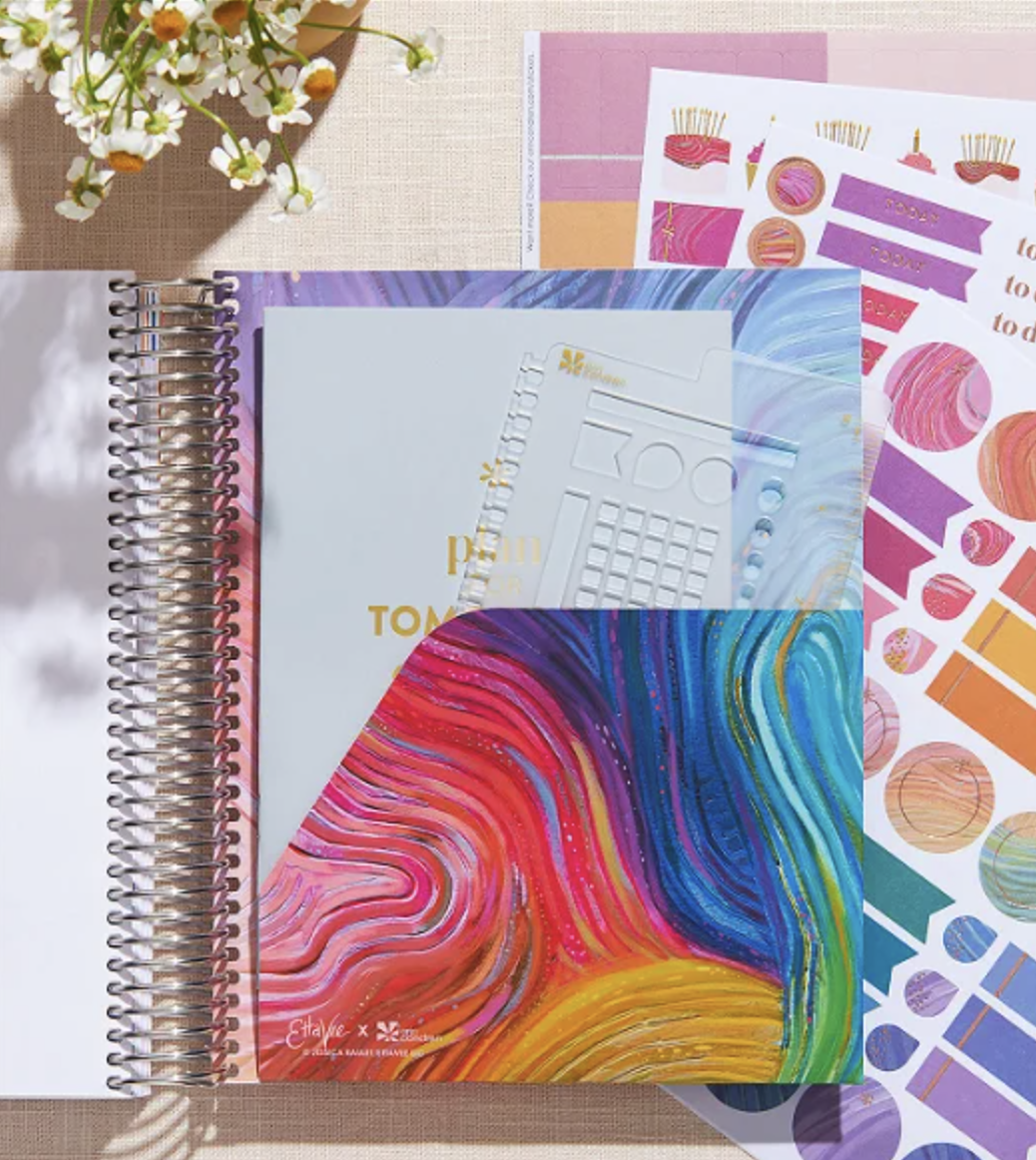 Erin Condren Life Planner 2023 opened to show the weekly planning view in May 2023