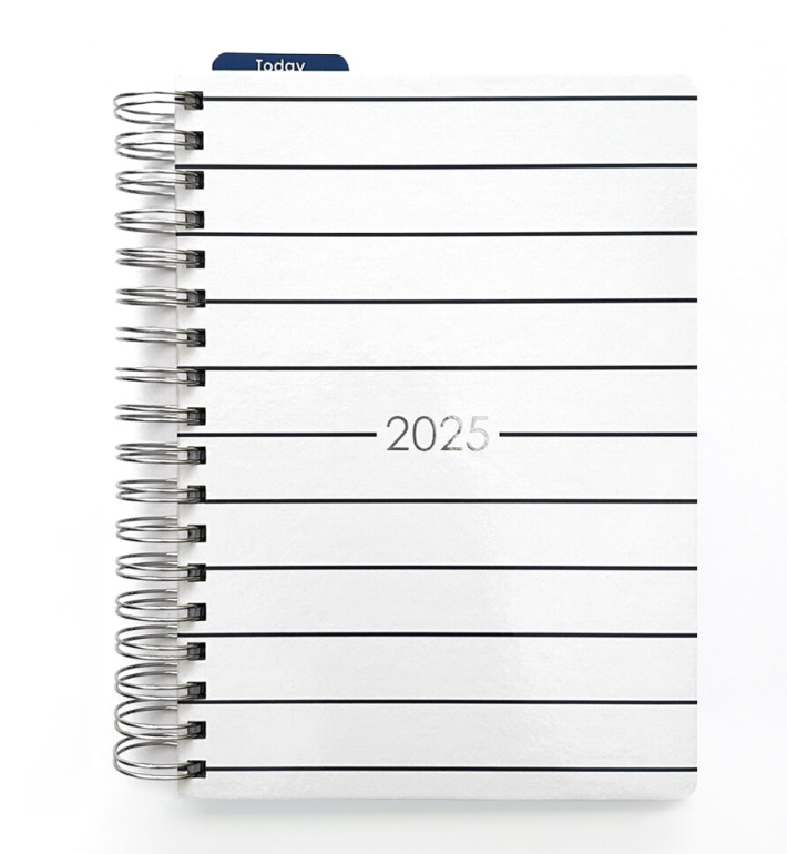 Erin Condren Life Planner 2023 opened to show the weekly planning view in May 2023