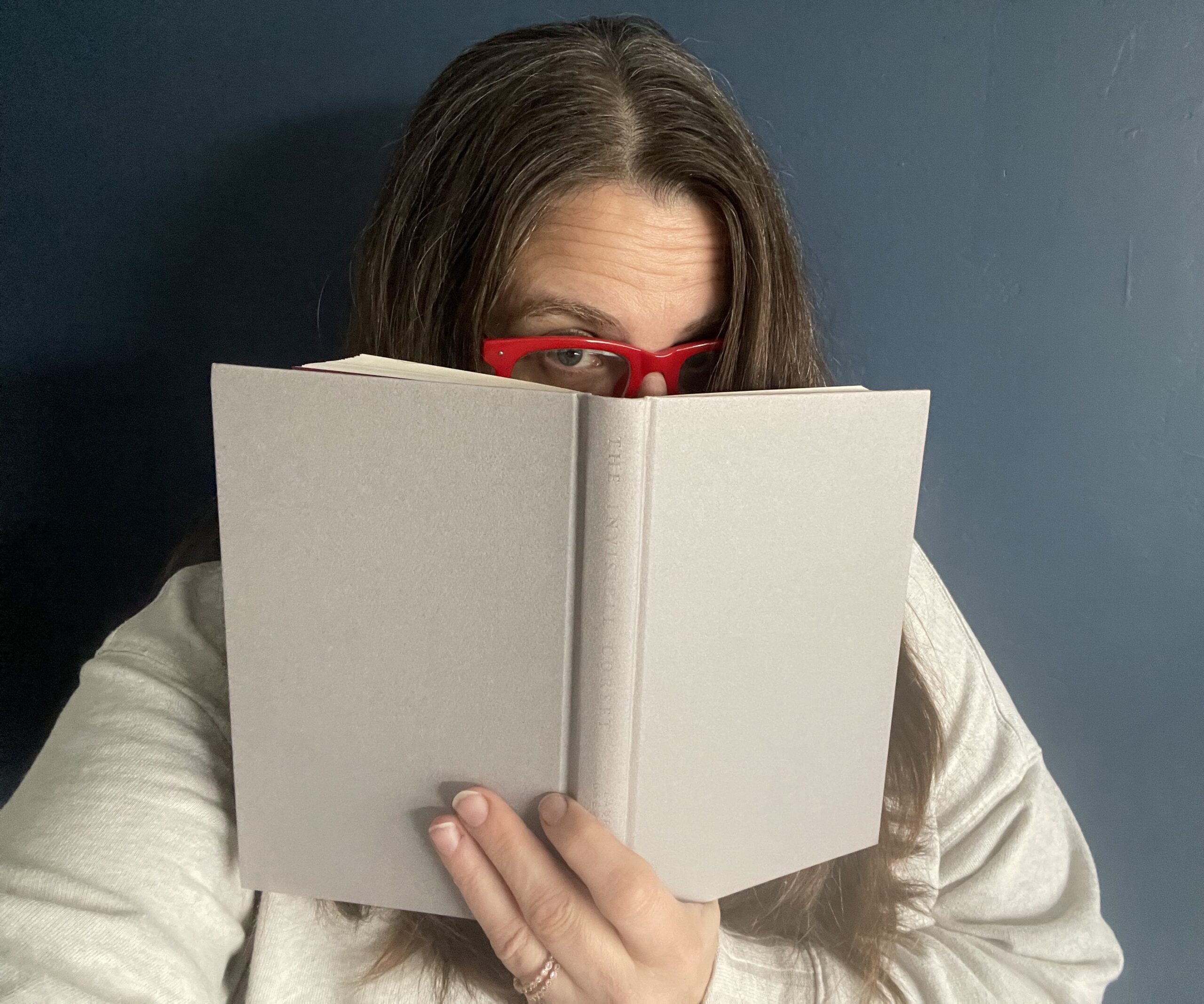 Becky Mollenkamp holding a book